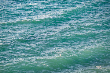 Image showing Turquoise clear water and small waves