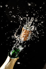 Image showing Champagne closeup from exploding bottles