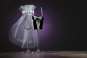 Image showing Two empty decorated champagne glasses for wedding party