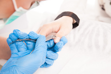 Image showing Specialist making manicure