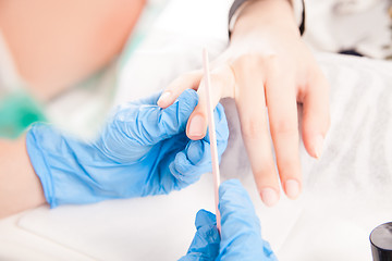 Image showing Specialist making manicure