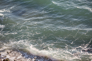 Image showing Beautiful small sea waves near the shore