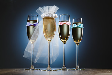 Image showing Glasses of champagne for bride and gentlemens