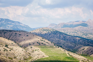 Image showing Panoramic views of beautiful silent nature, hills with plants, mountain