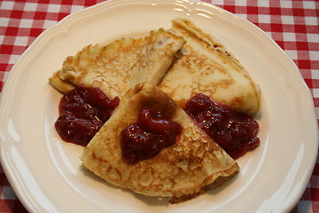 Image showing Pancakes with strawberry jam