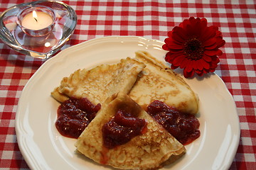 Image showing Pancakes with strawberry jam