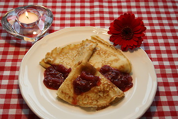 Image showing Pancakes with strawberry jam