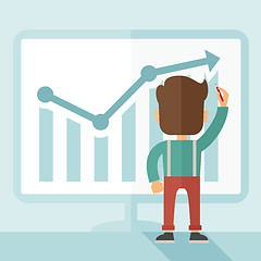 Image showing Successful businessman with a chart going up