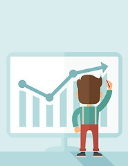 Image showing Successful businessman with a chart going up