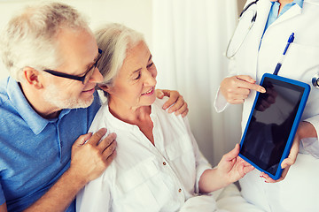 Image showing senior woman and doctor with tablet pc at hospital