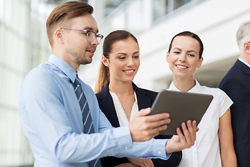 Image showing business people with tablet pc computer at office