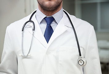 Image showing close up of doctor with stethoscope at hospital