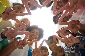 Image showing international students showing peace or v sign