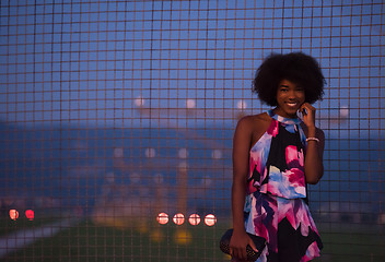 Image showing portrait of a young African-American woman in a summer dress