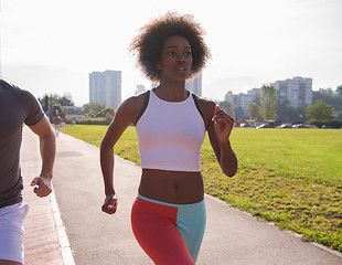 Image showing multiethnic group of people on the jogging