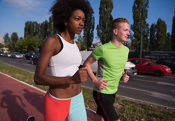 Image showing multiethnic group of people on the jogging