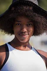 Image showing Close up portrait of a beautiful young african american woman sm