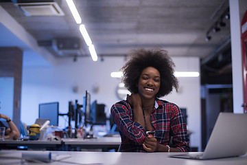 Image showing portrait of a young successful African-American woman in modern 