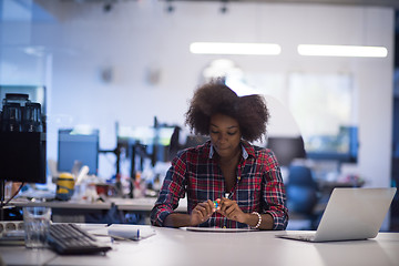 Image showing portrait of a young successful African-American woman in modern 