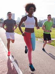 Image showing multiethnic group of people on the jogging