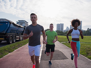 Image showing multiethnic group of people on the jogging