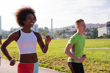 Image showing multiethnic group of people on the jogging