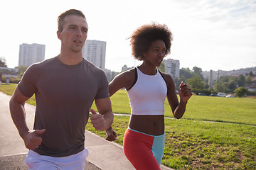 Image showing multiethnic group of people on the jogging