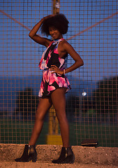 Image showing portrait of a young African-American woman in a summer dress