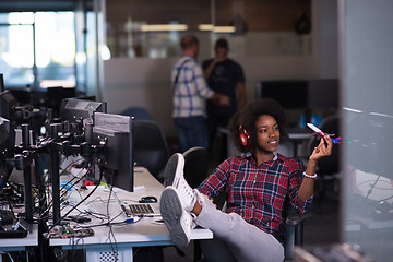 Image showing portrait of a young successful African-American woman in modern 