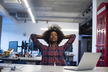 Image showing portrait of a young successful African-American woman in modern 