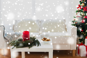 Image showing sofa, table and christmas tree with gifts at home