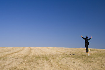 Image showing outstretch businessman