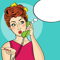 Image showing Surprised  pop art woman with retro phone