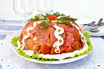 Image showing Salad with salmon in plate on tablecloth