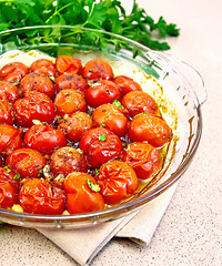 Image showing Tomatoes baked on granite table