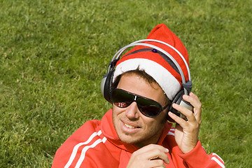 Image showing Santa likes Music