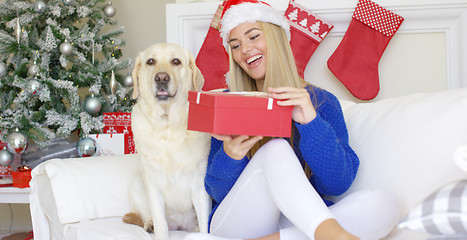 Image showing Beautiful sexy girl sitting at christmas time on sofa