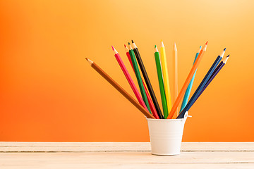 Image showing Color pencils in a white bucket