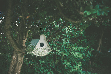 Image showing Birdhouse with decorative tree patterns