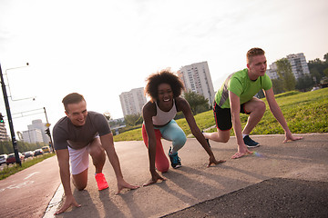 Image showing multiethnic group of people on the jogging