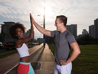 Image showing multiethnic group of people on the jogging