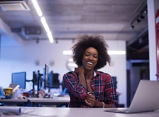 Image showing portrait of a young successful African-American woman in modern 