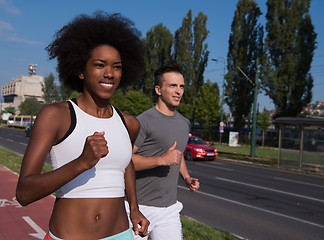 Image showing multiethnic group of people on the jogging