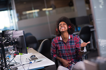 Image showing portrait of a young successful African-American woman in modern 