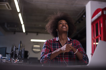 Image showing portrait of a young successful African-American woman in modern 