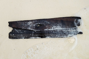 Image showing old wood board on a beach