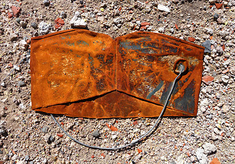 Image showing Old crushed rusty bucket