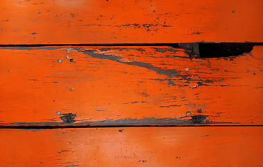 Image showing Old wood board painted red