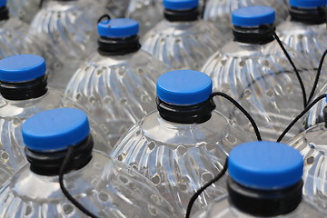 Image showing  row plastic bottles 