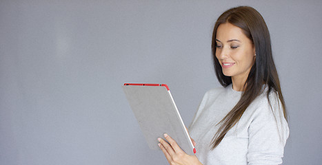 Image showing Beautiful middle aged woman using tablet computer